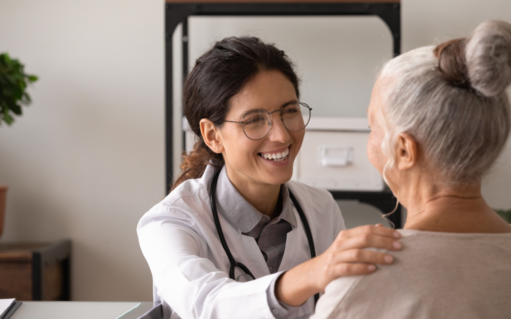 Medical Cannabis Doctor offering a patient support with hand on shoulder