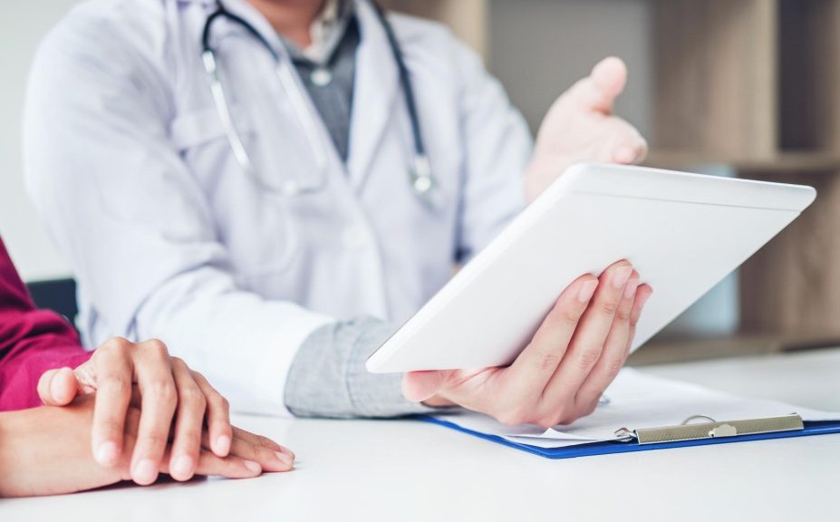 Medical Cannabis Doctor holding a notepad.