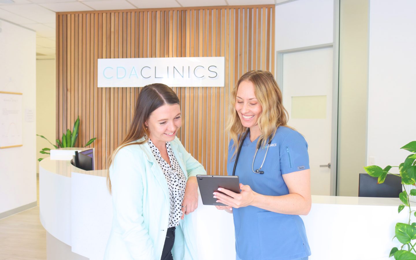 Doctor showing patient the process for medical cannabis and cbd oil therapies in Australia